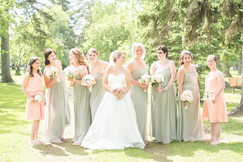 Bridesmaids pose for picture at Vickers Park