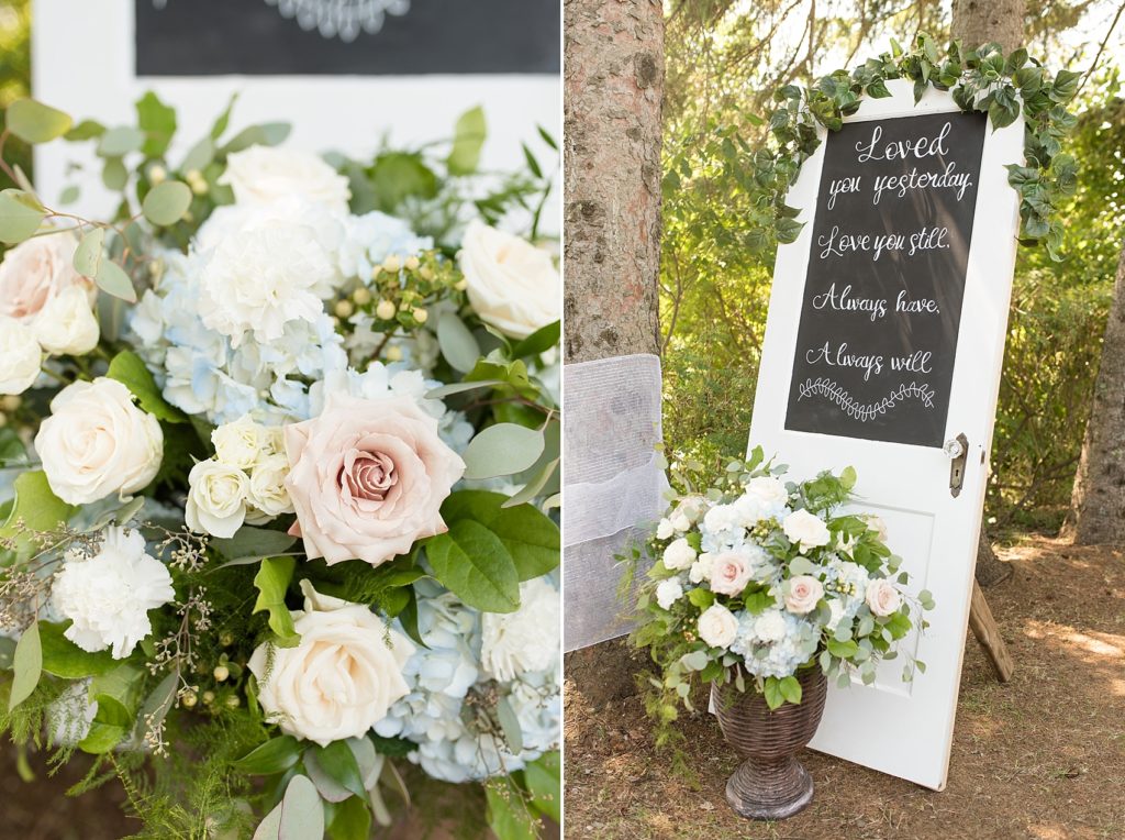 Beautiful entrance to ceremony site with handmade signs and fresh flowers