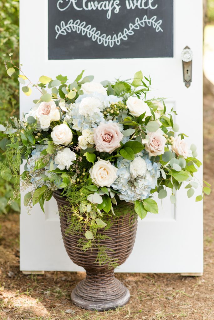 Beautiful fresh flowers in front of handmade signs