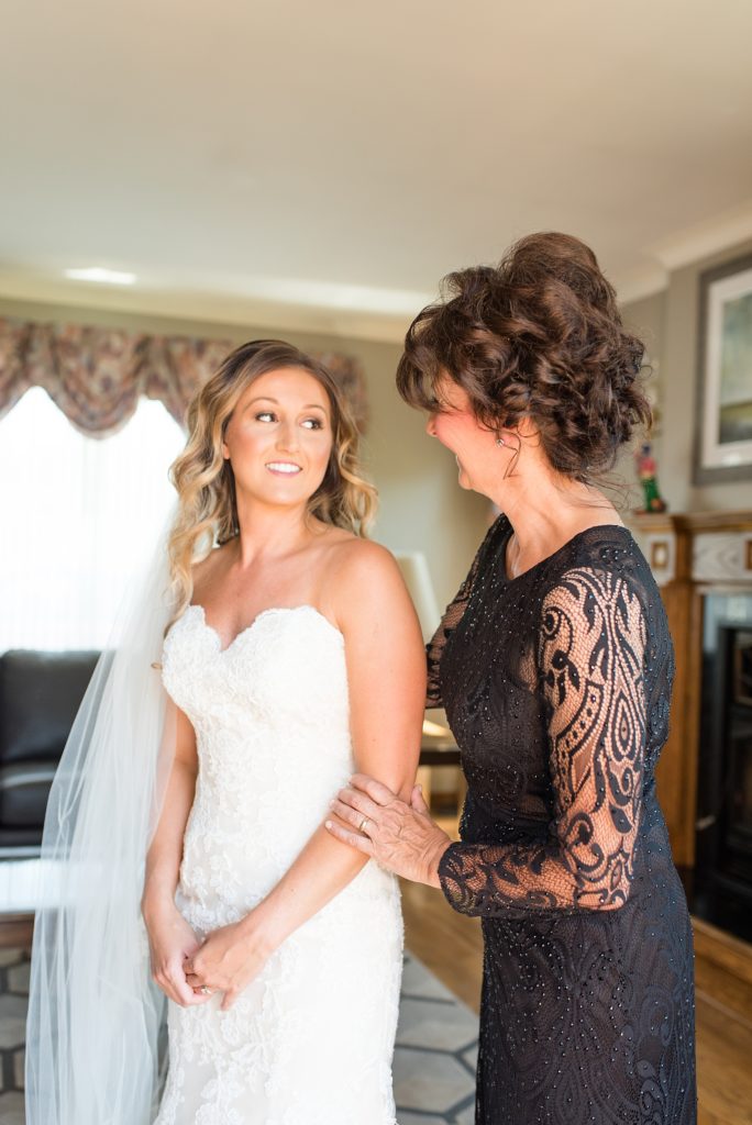 Bride and her mom sharing a moment