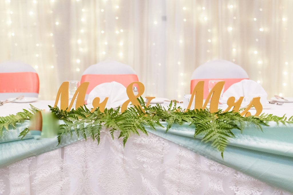 Mint and coral wedding at the Valhalla Inn in Thunder Bay with details by Little Details Design