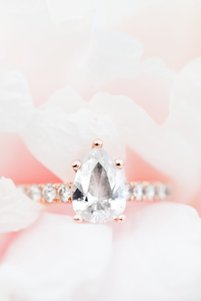 A beautiful teardrop diamond ring photographed during Thunder Bay engagement session