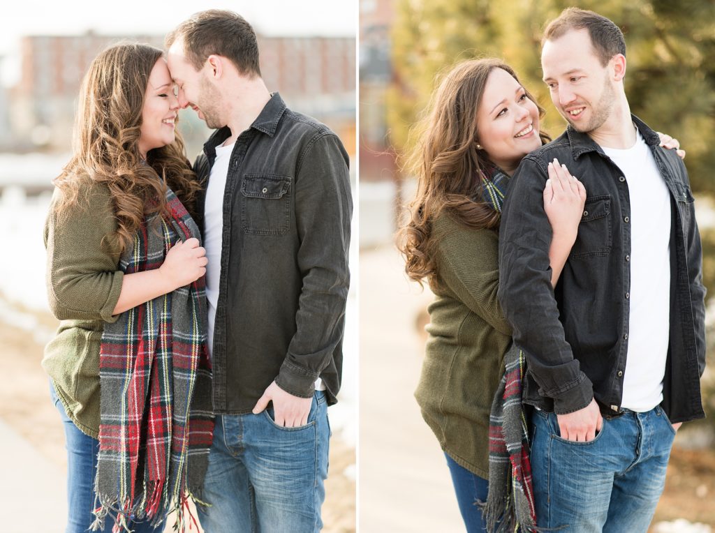 A London couple snuggles up during their winter engagement session at Marina Park in Thunder Bay