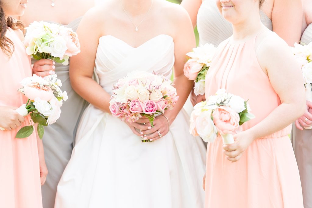 Bridesmaids and bride holding their bouquets