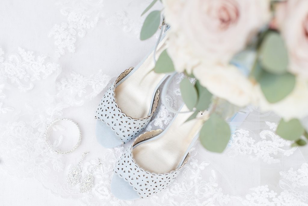 Wedding jewellery, shoes, and bouquet