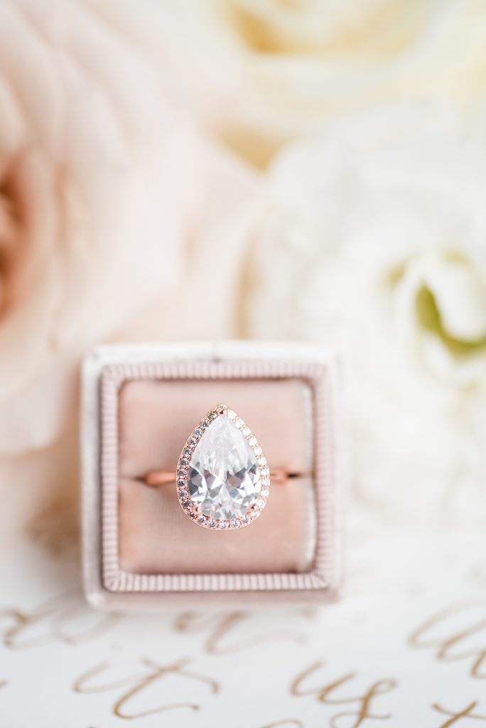 Teardrop rose gold and diamond ring in a pink heirloom ring box from The Mrs. Box