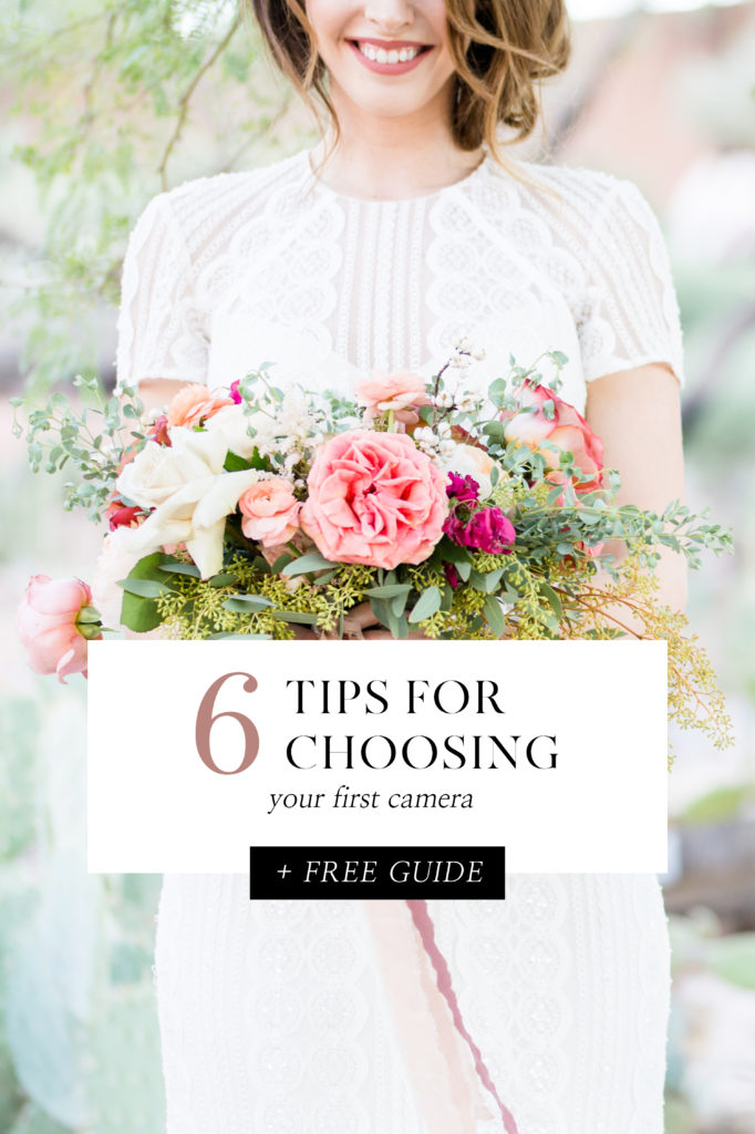 Bride in boho style gown holding a bouquet of peonies, roses, and spray flowers. Text overlay reads 6 tips for choosing your first camera plus free guide